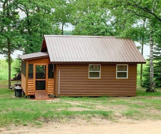 Cabin 4 in woodland setting and lake in background